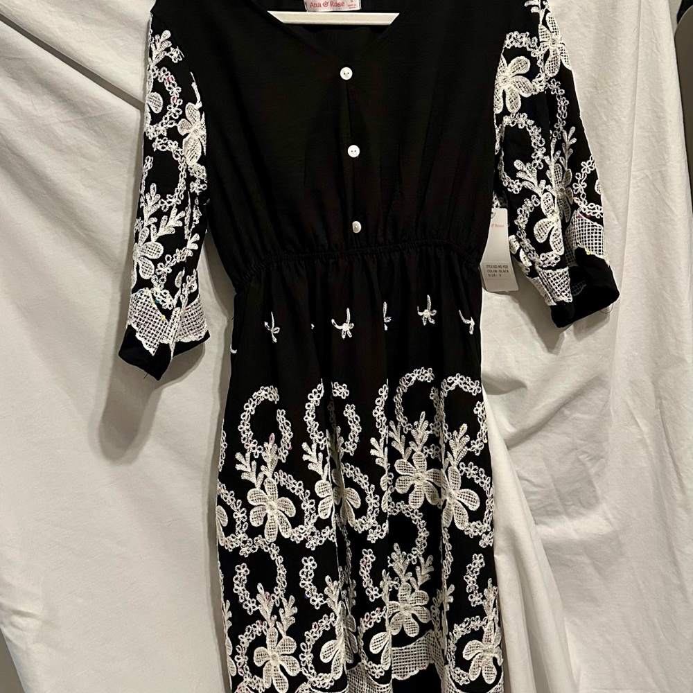 Elegant Black and White Midi Dress